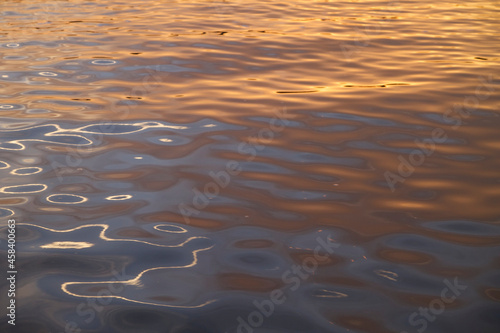 Beautiful sunset reflecting on the water while sailing at Narragansett Bay, Rhode Island USA