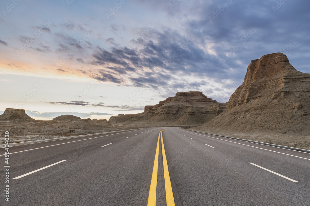 road through the wind erosion physiognomy in sunset