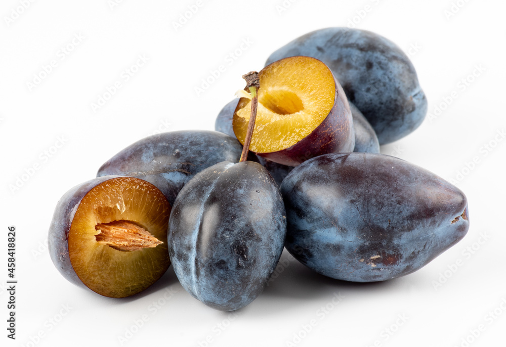 fresh plum fruit and cut plum slices isolated on white background. fresh plum fruit and cut plum slices isolated on white background.