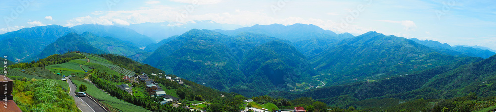 The tea plantations on the hilltop are often shrouded in clouds and fog. Bihushan Tea Garden, Meishan Township. Chiayi County, Taiwan. Sep. 2021 The tea plantations on the hilltop are often shrouded in clouds and fog. Bihushan Tea Garden, Meishan Township. Chiayi County, Taiwan. Sep. 2021