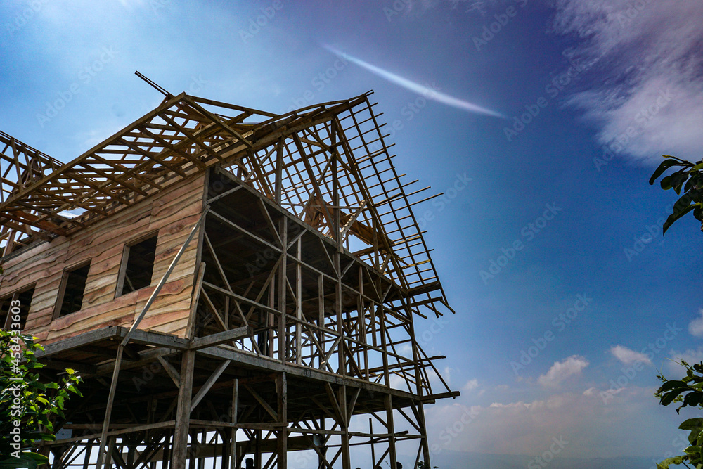 In progress construction of a wooden house