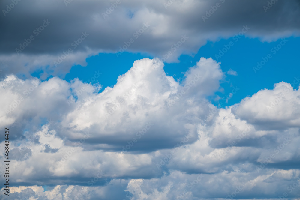 Obraz premium Blue sky background with white clouds. Beautiful clouds at sunset.