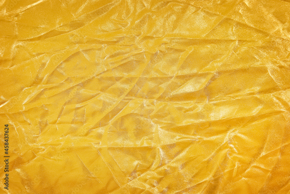Yellow gold cloth wrinkled pattern texture abstract background