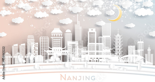 Nanjing China City Skyline in Paper Cut Style with White Buildings, Moon and Neon Garland.