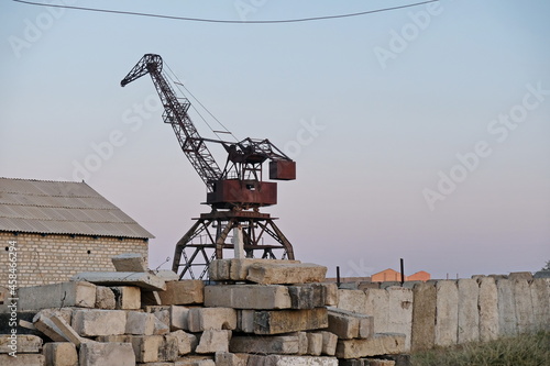 Aralsk, Kazakhstan - 10.04.2020 : The old metal structure of the destroyed port on the Aral Sea photo