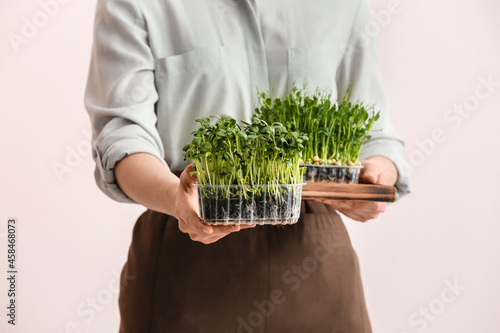 Woman with micro green on l...