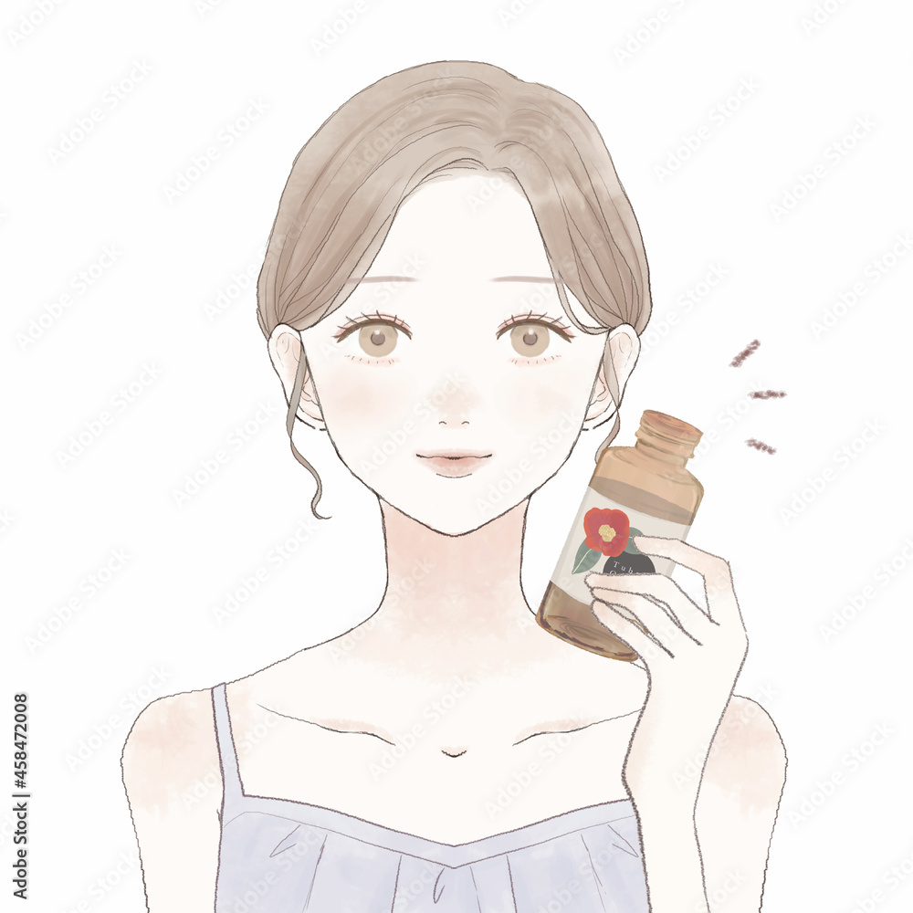 椿油を持つ女性