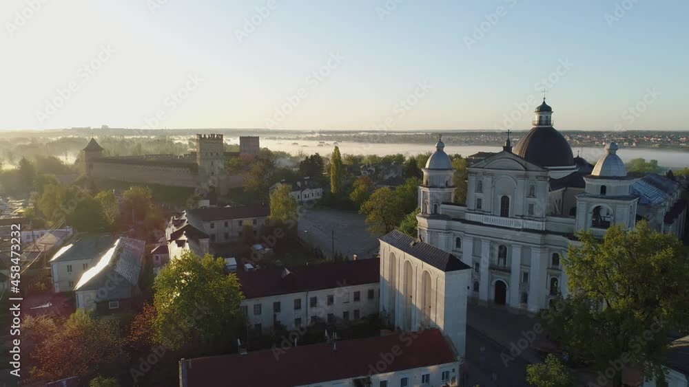 Castle Square of Lutsk, Ukraine. Morning flight over Lubart's castle and Cathedral of the Holy Apostles Peter and Paul built Giacomo Briano. Castle Square of Lutsk, Ukraine. Morning flight over Lubart's castle and Cathedral of the Holy Apostles Peter and Paul built Giacomo Briano.