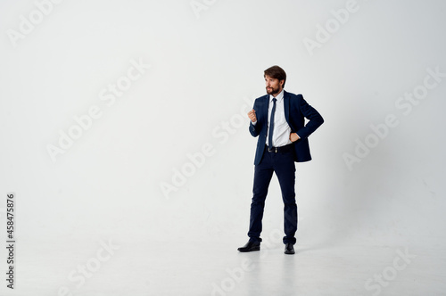 businessmen posing executive light background