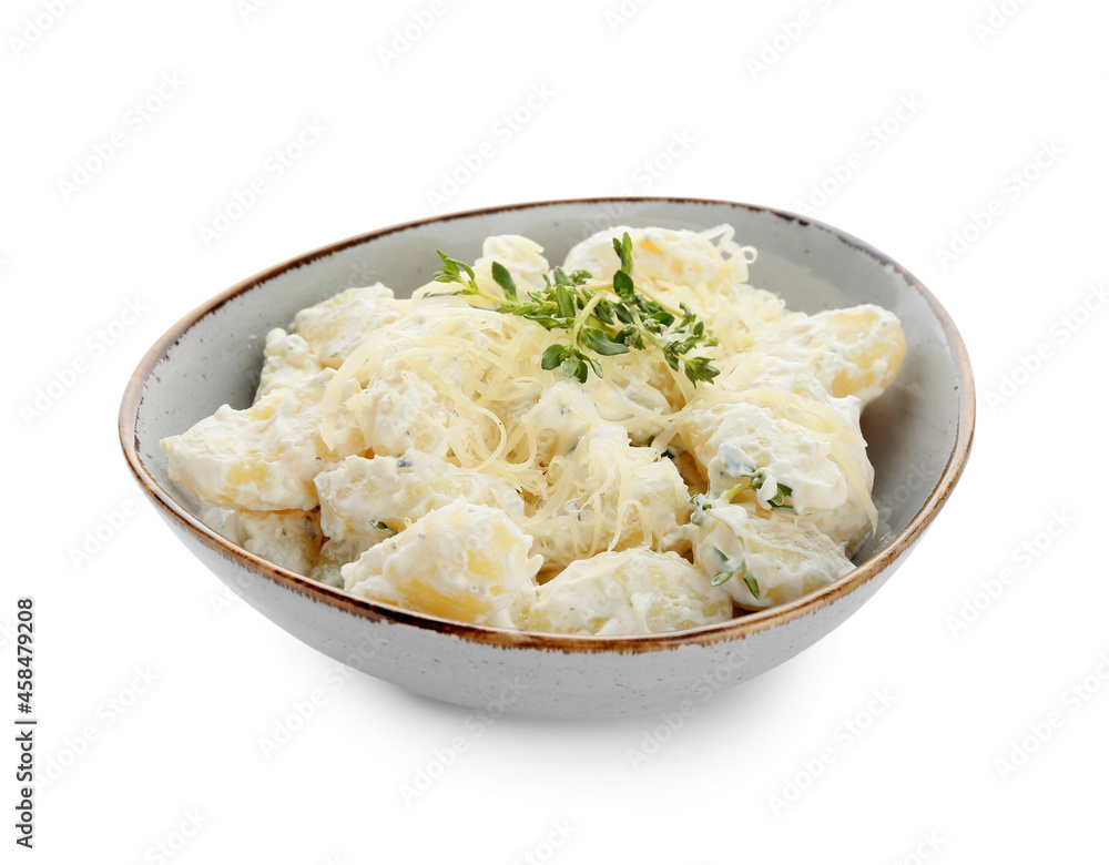 Bowl of delicious gnocchi with creamy sauce on white background Bowl of delicious gnocchi with creamy sauce on white background
