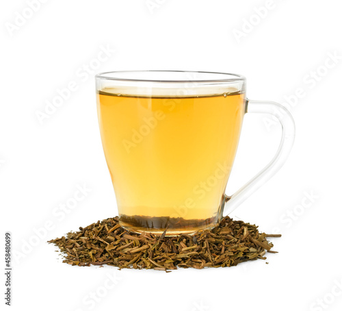 Cup of tasty hojicha green tea on white background