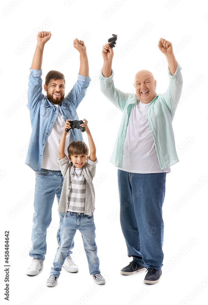 Fototapeta premium Happy man, his little son and father playing video game on white background