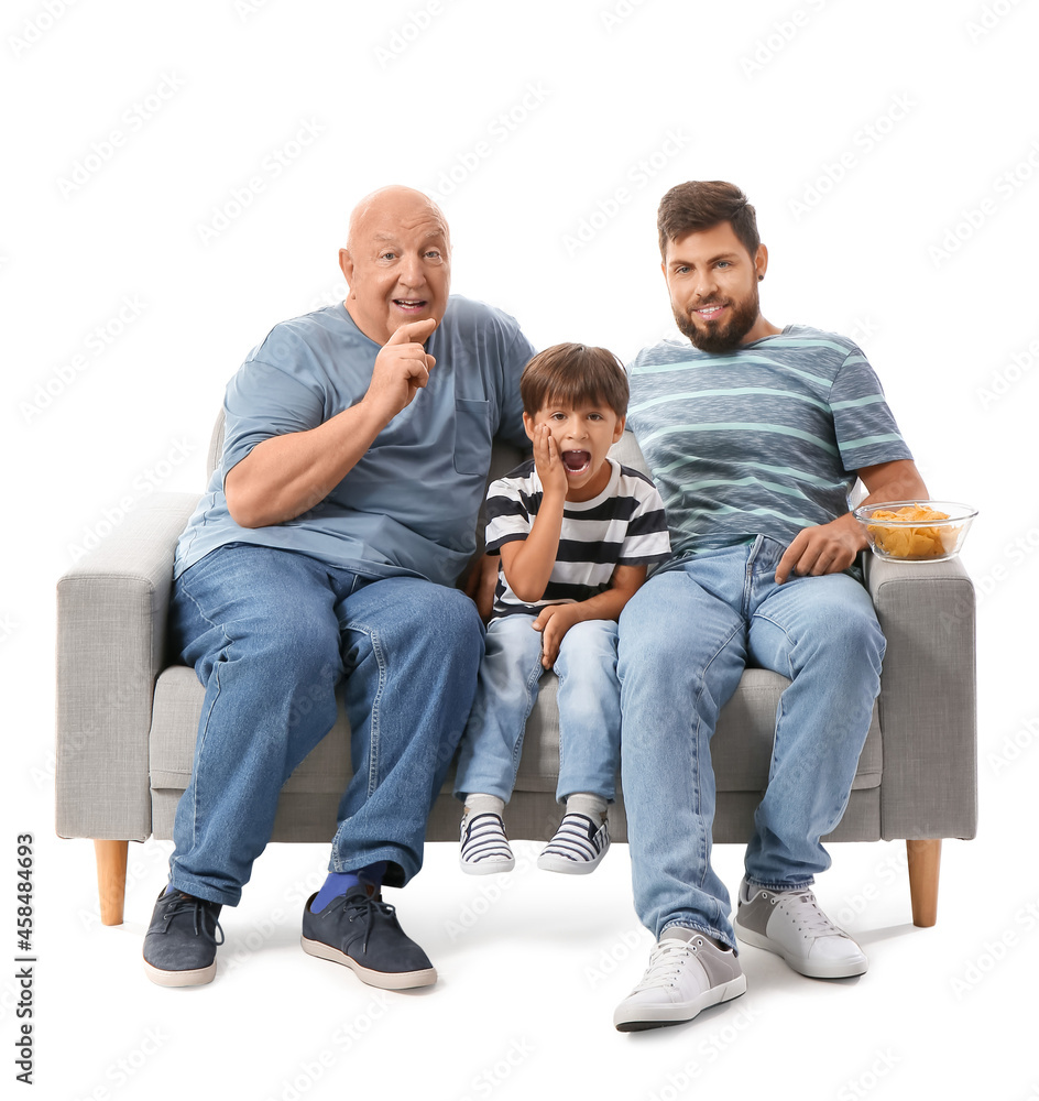 Man, his little son and father watching TV on white background Man, his little son and father watching TV on white background
