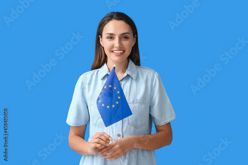 Young woman with flag of Eu...