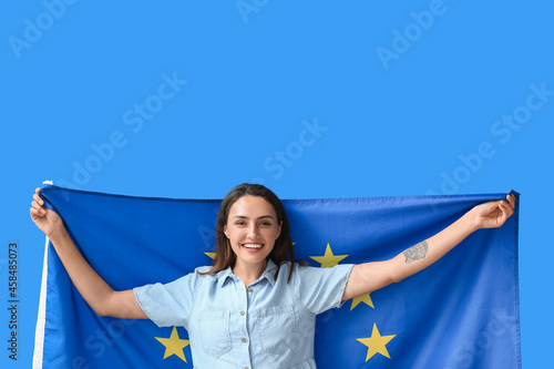Young woman with flag of Eu...