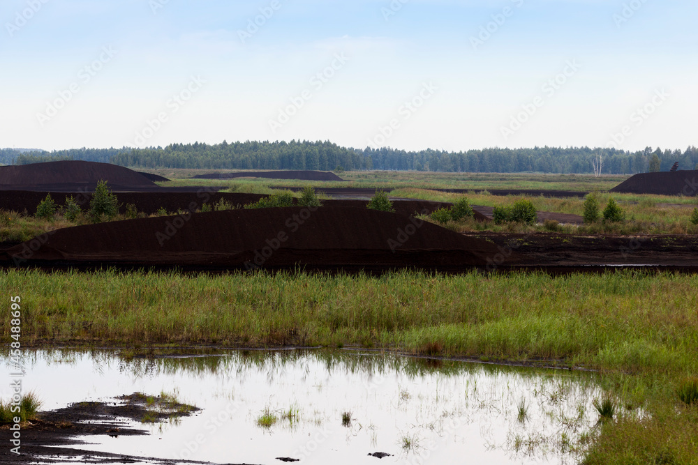 the flooded area where peat is extracted the flooded area where peat is extracted
