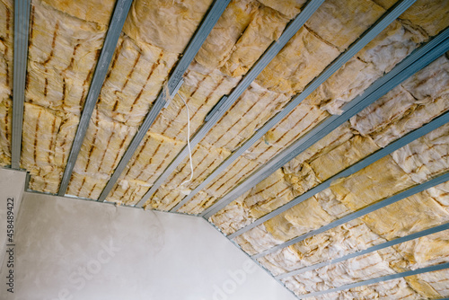 Принти на полотні insulation of the attic with glass wool