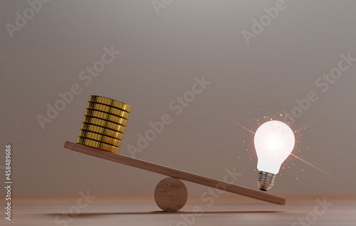 Fotografie Unbalance of lightbulb glowing and golden coins money on seesaws for creative thinking idea can make more  treasure and money concept by 3d rendering