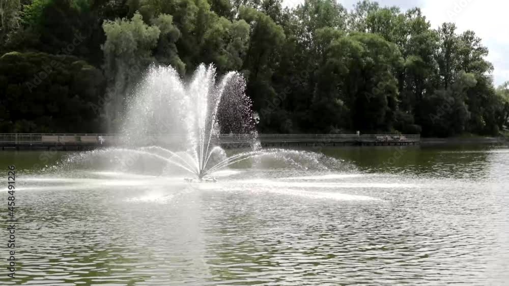 Fountain on the lake. City pond. Lake in the park. Fountain in the middle of the pond. Fountain on the lake. City pond. Lake in the park. Fountain in the middle of the pond.