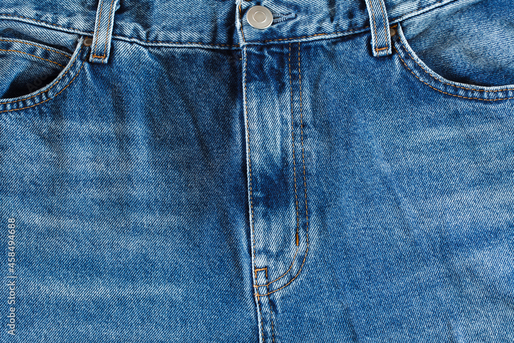 Jeans pants front with pockets and fly, close-up macro view Jeans pants front with pockets and fly, close-up macro view