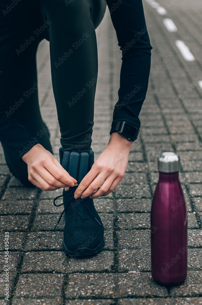 Woman is running in urban area Woman is running in urban area
