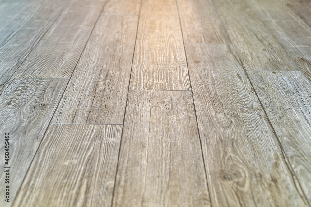 Light wooden slatted floor with light reflection Light wooden slatted floor with light reflection