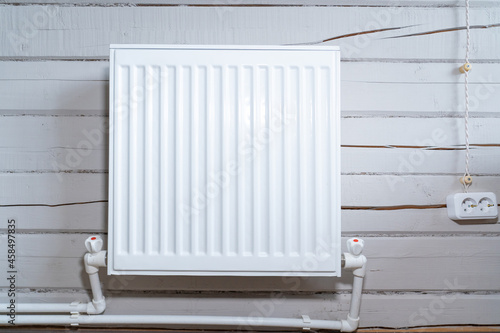 Wallpaper Mural White radiator for heating on a wooden wall made of timber Torontodigital.ca