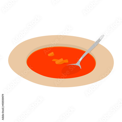 Teller mit Tomatensuppe und Löffel