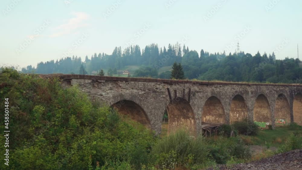 Old railway bridge viaduct, mountians landscape Old railway bridge viaduct, mountians landscape