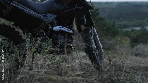 Wallpaper Mural black-color cross motorcycle in the forest Torontodigital.ca