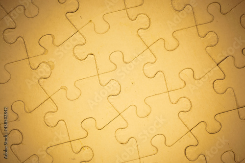 Brown Jigsaw puzzle background.