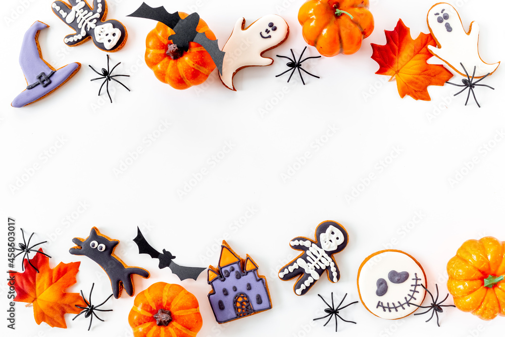 Funny Halloween party cookies with spiders flat lay top view