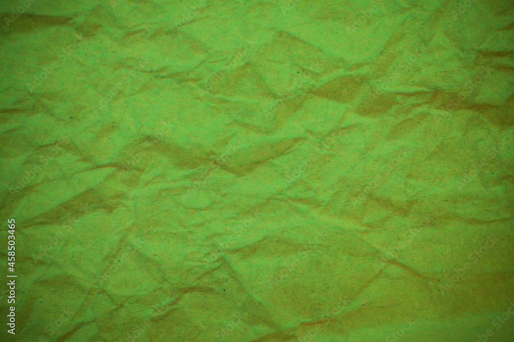 Green crumpled paper background. Green crumpled paper background.