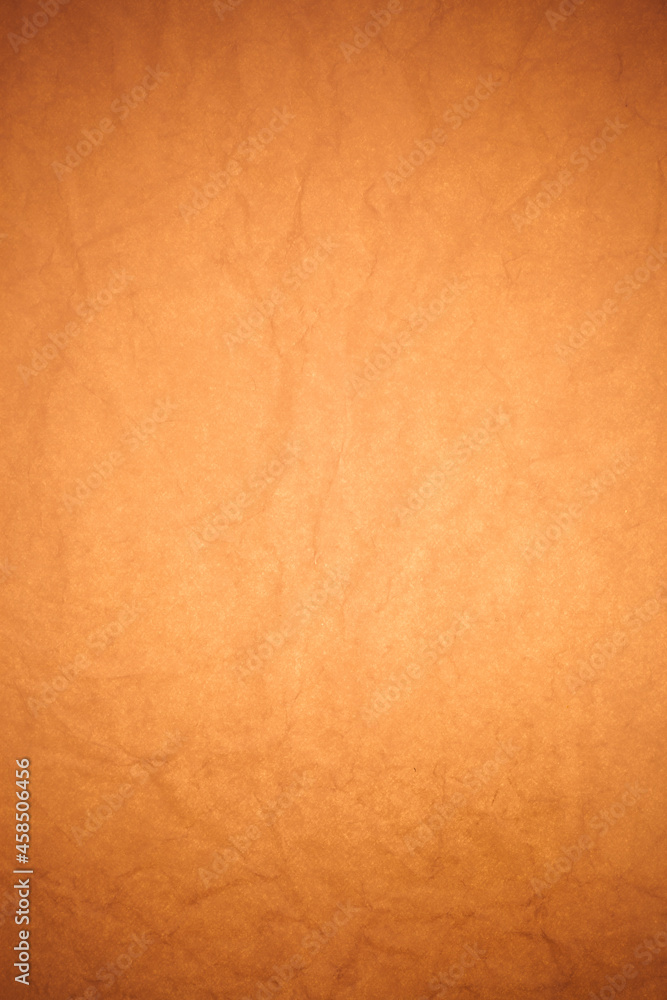 Fototapeta premium Crumpled brown paper background.