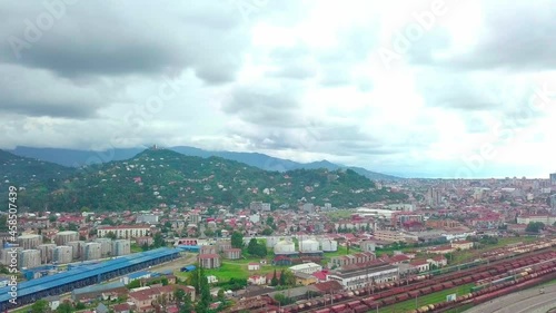 A drone flies over a railway station. A bird's-eye view from above. marshalling yard. there are a lot of railway cars. depot. Trains . Logistics and cargo transportation, containers and tanks. photo