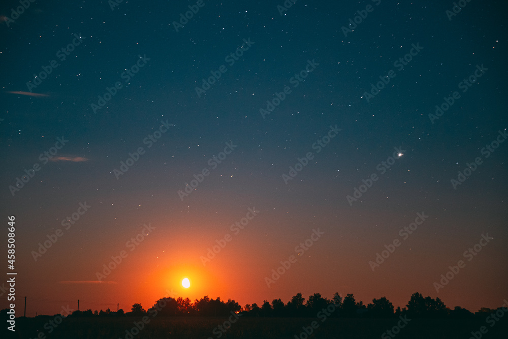 Moonrise Above Summer Forest park. Night Countryside Summer Starry Night Sky landscape