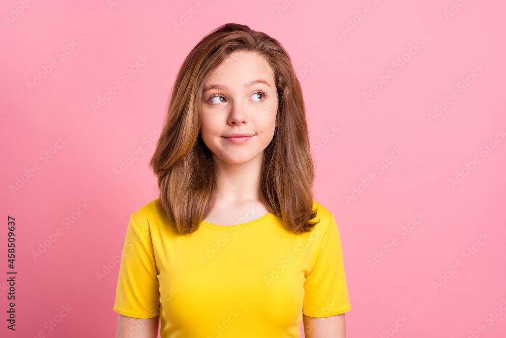 Photo of young attractive girl happy positive smile think dream look empty space isolated over pink color background Photo of young attractive girl happy positive smile think dream look empty space isolated over pink color background