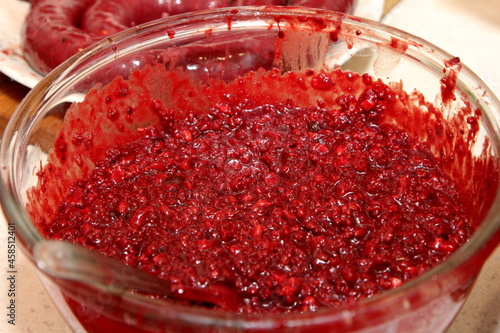 Glass bowl with blood ingredients for making blood sausage. Organic blood pudding.