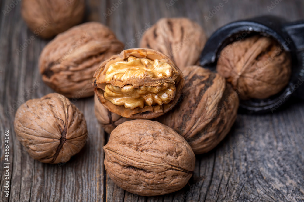 Walnuts on the wooden background Walnuts on the wooden background