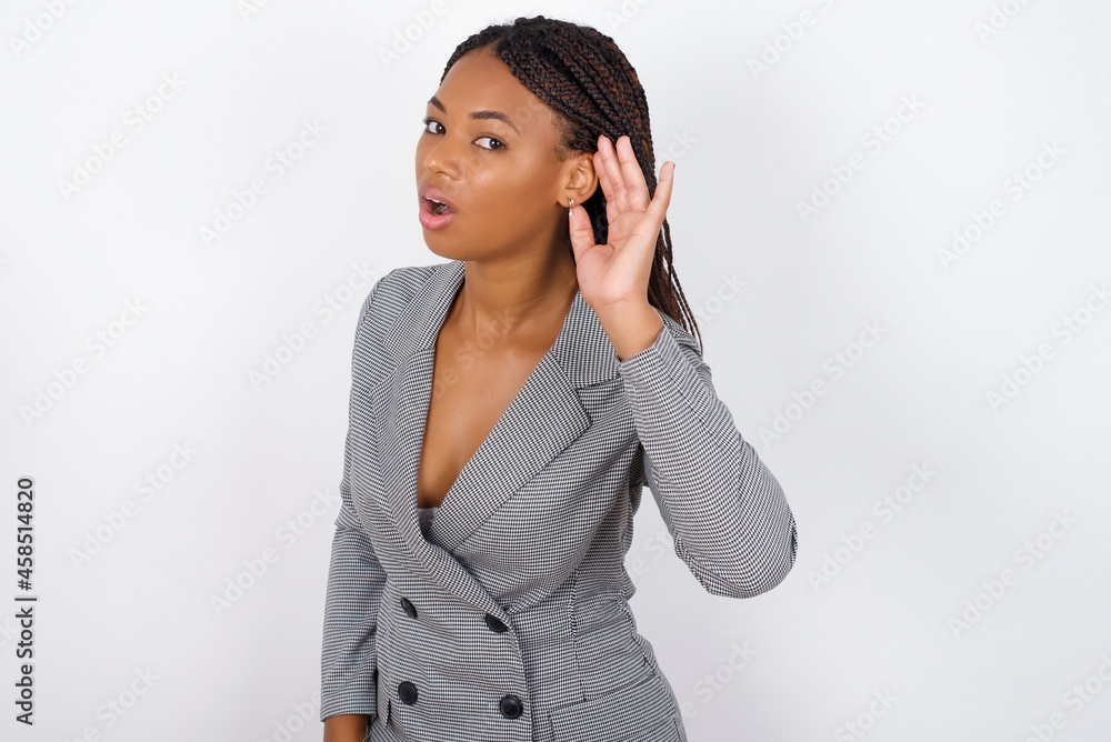 Oh my God! Funny astonished MODEL opening mouth widely looking aside, with hand near ear trying to listen to gossips. Oh my God! Funny astonished MODEL opening mouth widely looking aside, with hand near ear trying to listen to gossips.