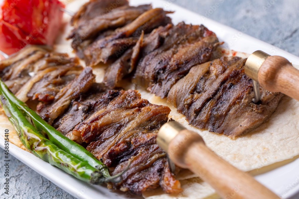 Traditional delicious Turkish food; Oltu cag kebabi, doner grilled kebab from Erzurum cuisine Traditional delicious Turkish food; Oltu cag kebabi, doner grilled kebab from Erzurum cuisine