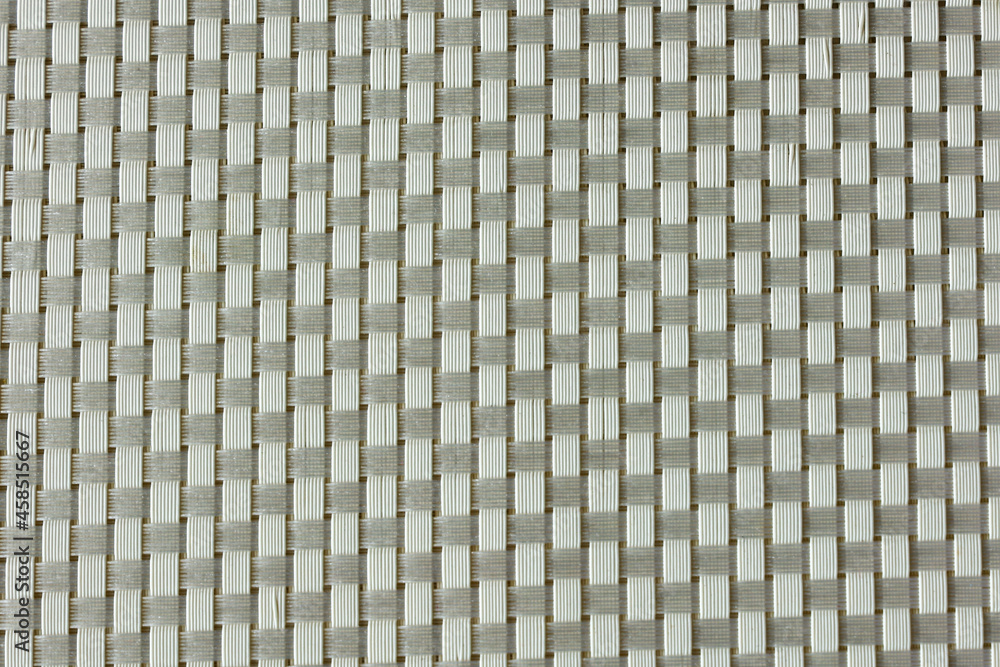 simple woven texture braided mat may used as background. woven strips brown background. simple woven texture braided mat may used as background. woven strips brown background.