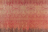 Indian red silk fabric texture used as background. decorative woven jute cloth Christmas red decorative fabric