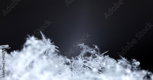 Snowflake on snow. Winter holidays and Christmas background  © vadim_fl