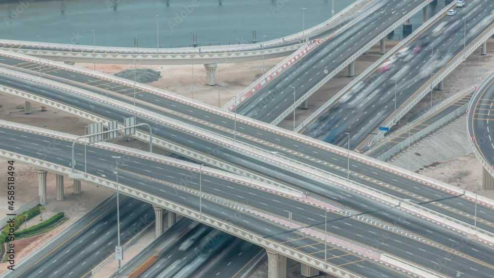 Top view city traffic on a big crossroad in Business bay timelapse. Top view city traffic on a big crossroad in Business bay timelapse.