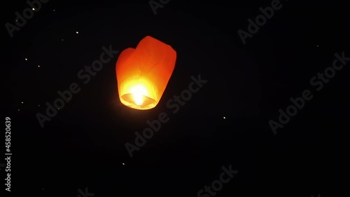 The Chinese lantern flies up in the sky photo