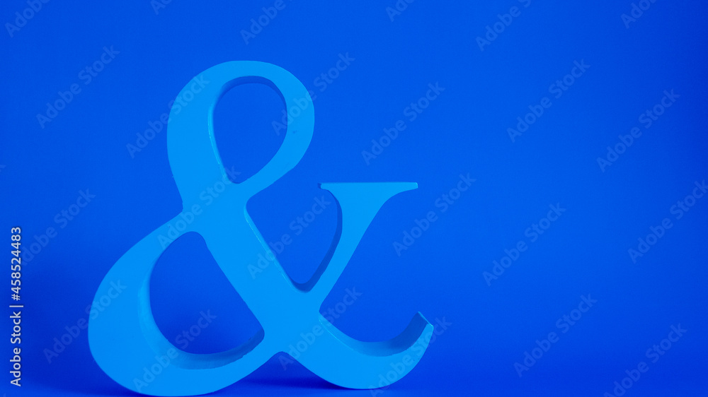 minimalistic blue ampersand on blue background minimalistic blue ampersand on blue background