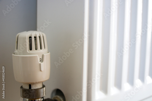 Detail of radiator heating thermostatic valve turned to lowest number, 2