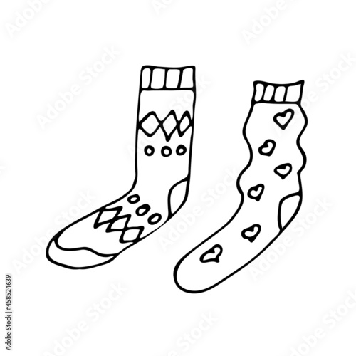 Doodle image of two different socks. A symbol of fashion, warmth, winter, winter sports, winter games. Drawing in the style of a doodle. Creative work with ink