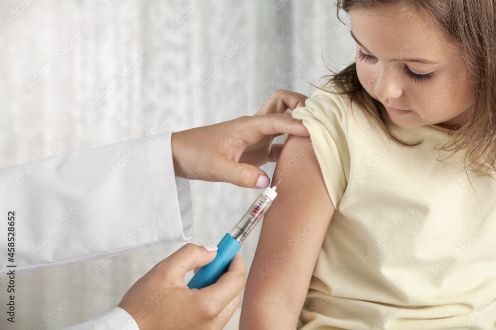 Young patient visits a skillful doctor at hospital for vaccination . Covid 19 and coronavirus vaccination Young patient visits a skillful doctor at hospital for vaccination . Covid 19 and coronavirus vaccination